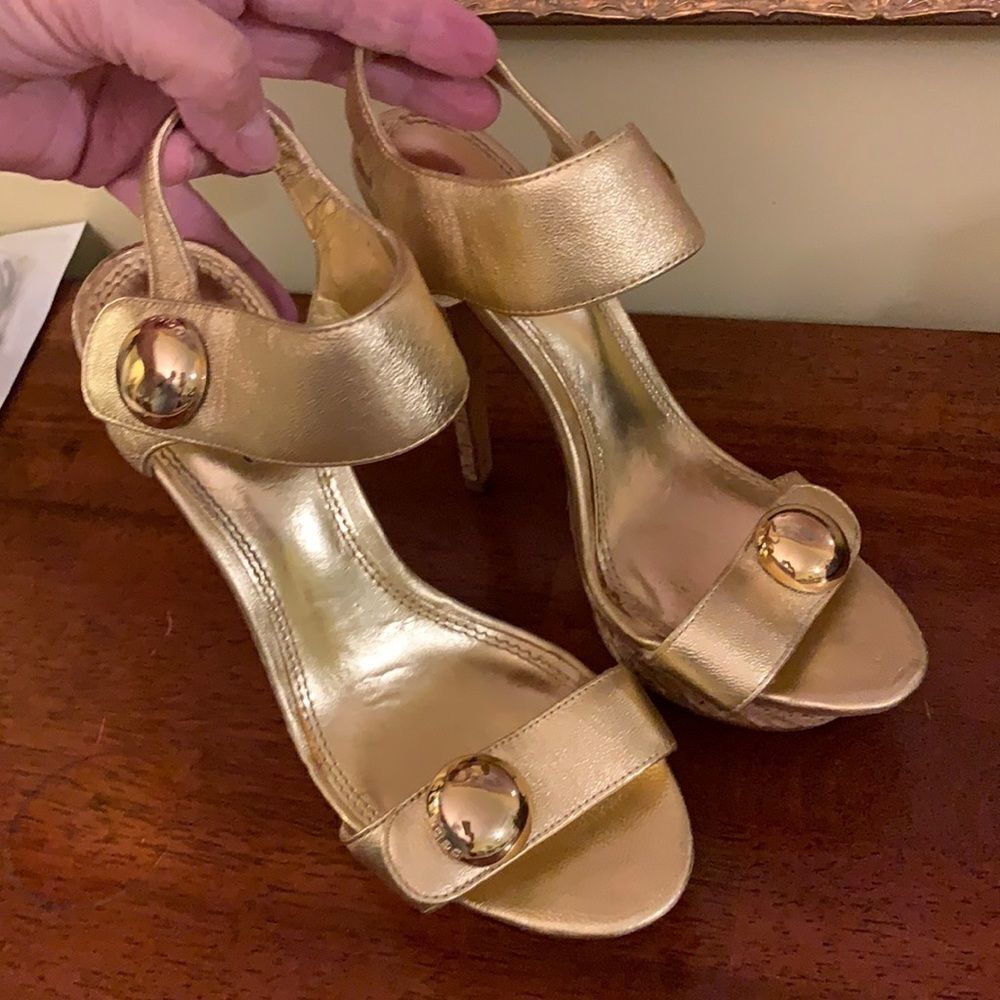 Size 7 M gold Bebe heels